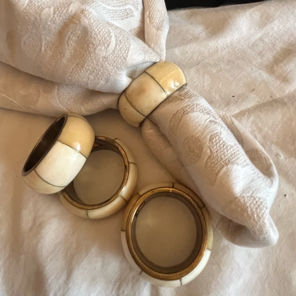 Set Four Brass and Bone Napkin Rings